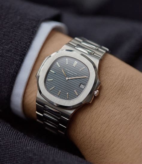 patek philippe nautilus on wrist white suit|patek philippe nautilus diamond price.